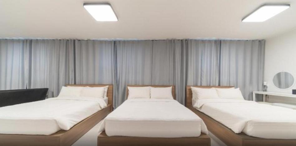 La Famille Hotel Янгянг Стая снимка
